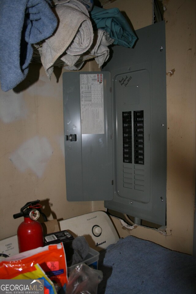 utility room with electric panel