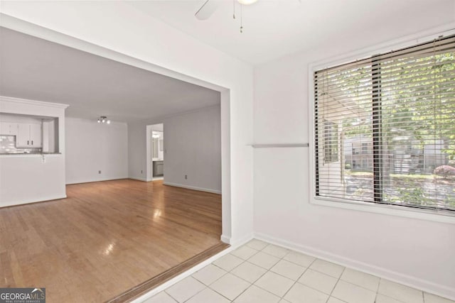 empty room featuring light hardwood / wood-style floors and ceiling fan