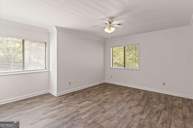 unfurnished room with dark hardwood / wood-style flooring, ornamental molding, and ceiling fan