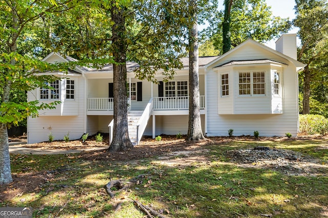 view of front of home featuring covered porch