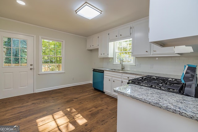 kitchen featuring sink, dishwasher, range, light stone counters, and white cabinets