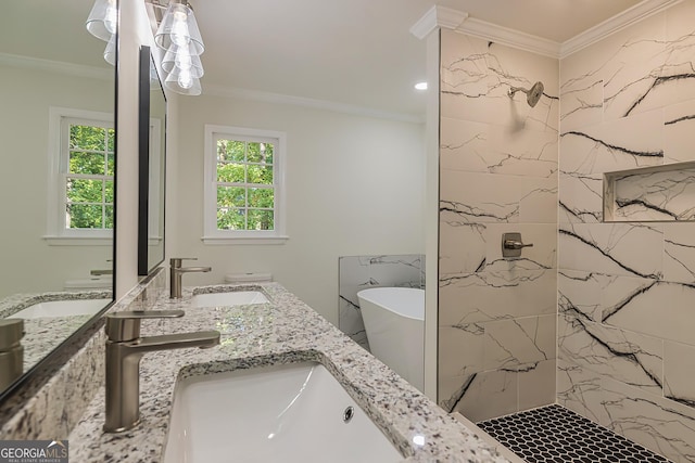 bathroom featuring ornamental molding, separate shower and tub, and vanity