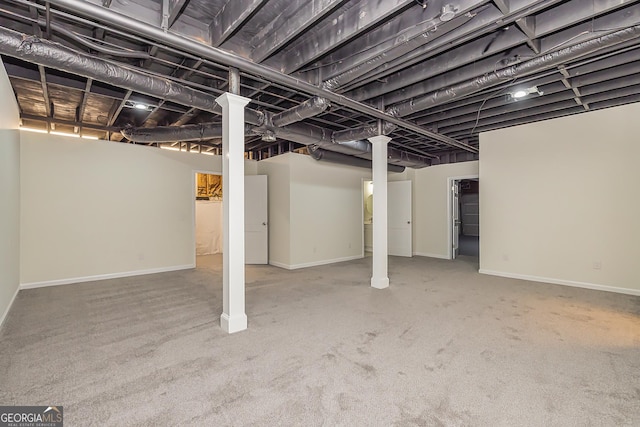 basement featuring carpet flooring