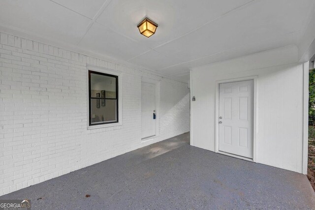 interior space with brick wall