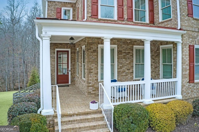 entrance to property with a porch