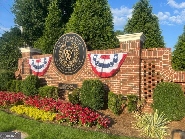 view of community sign