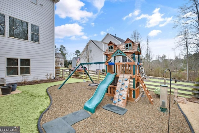 view of playground with a yard