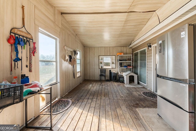 interior space featuring wooden ceiling