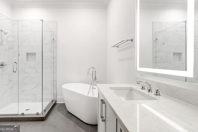 bathroom with tile patterned flooring, ornamental molding, vanity, and plus walk in shower