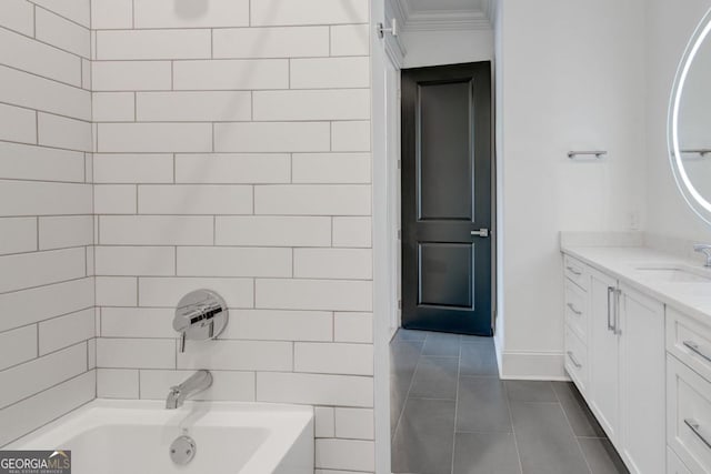 bathroom featuring vanity, tile patterned flooring, tub / shower combination, and crown molding