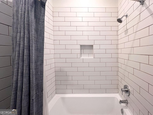 bathroom featuring shower / bath combination with curtain