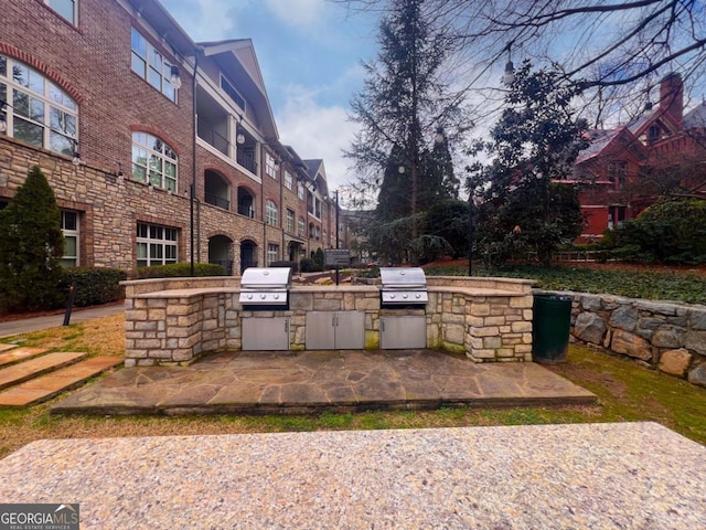 view of patio / terrace with an outdoor kitchen and grilling area