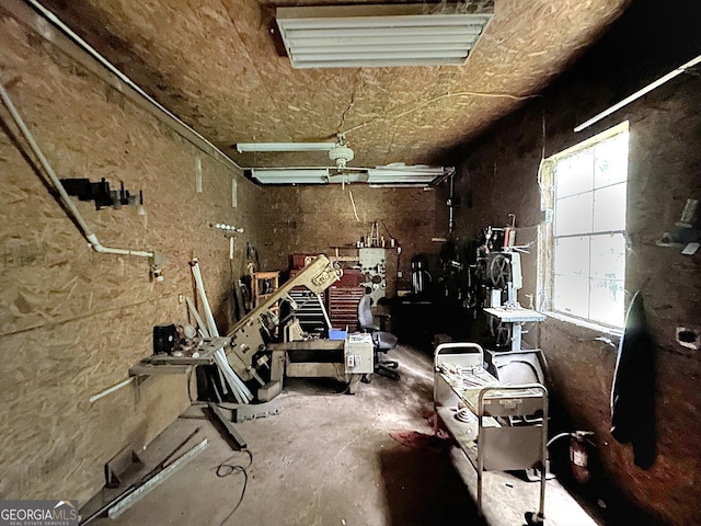 miscellaneous room featuring a workshop area