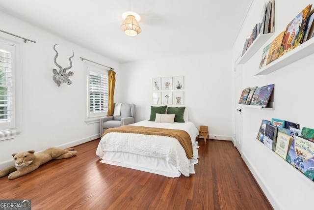 bedroom featuring hardwood / wood-style floors