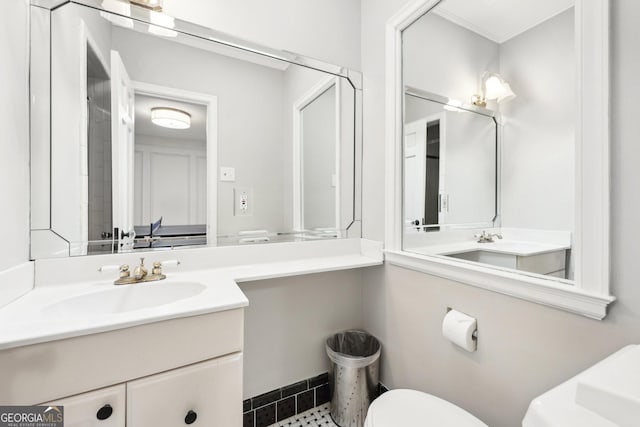 bathroom featuring sink and toilet