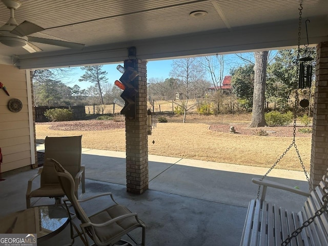 view of patio / terrace featuring ceiling fan