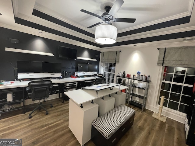 office featuring ornamental molding, dark hardwood / wood-style floors, ceiling fan, and a tray ceiling