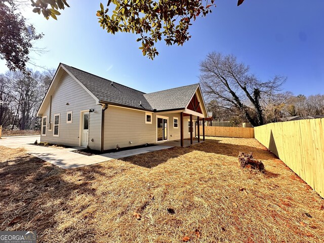 view of property exterior featuring a patio