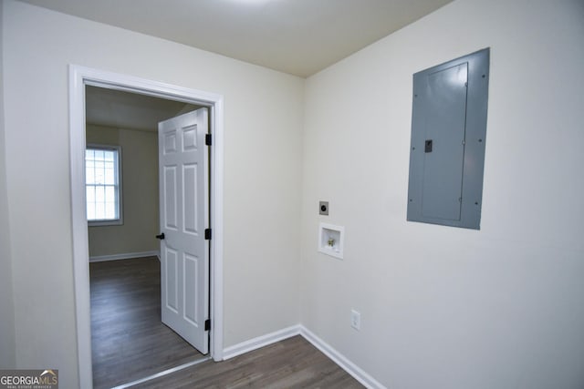 washroom featuring hookup for a washing machine, dark wood-type flooring, hookup for an electric dryer, and electric panel