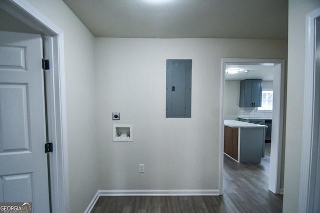 laundry area featuring dark wood-type flooring, washer hookup, electric panel, and electric dryer hookup