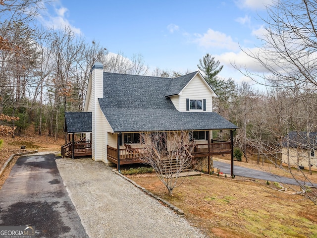 view of front of home with a wooden deck