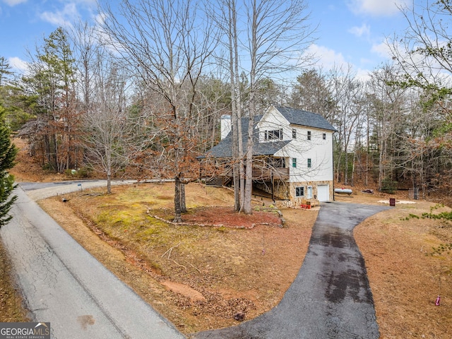 view of front of property featuring a garage