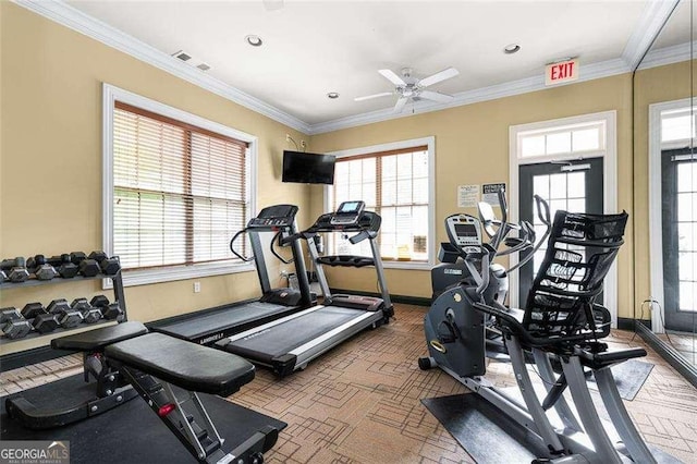 exercise room with ornamental molding and ceiling fan