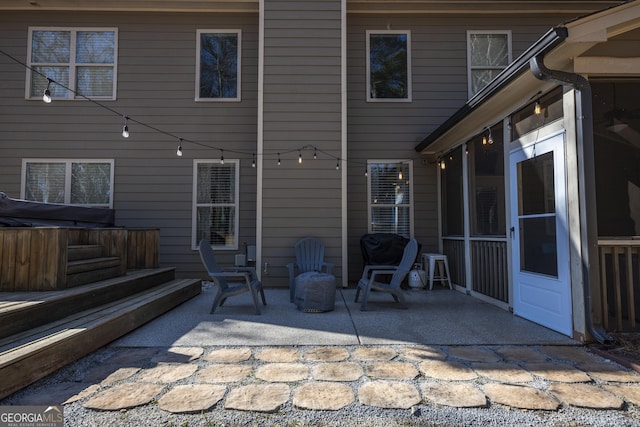 view of patio with a hot tub