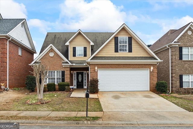 view of front of property with a garage