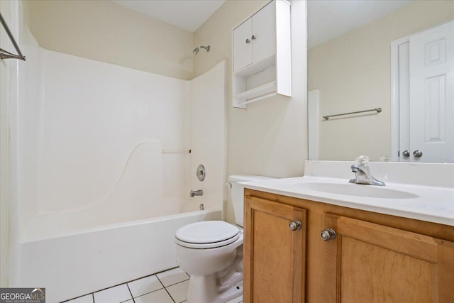 full bathroom with tile patterned flooring, vanity, bathing tub / shower combination, and toilet