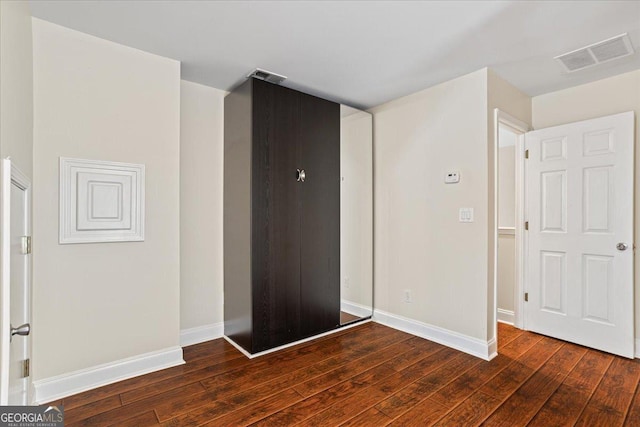 interior space with dark wood-type flooring