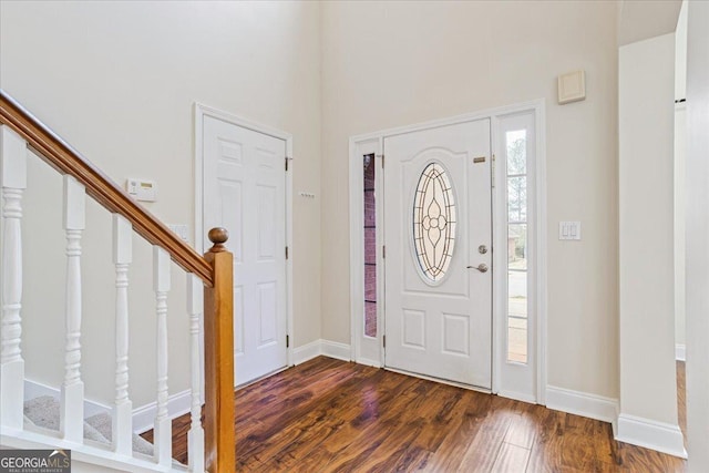 entrance foyer with dark wood-type flooring