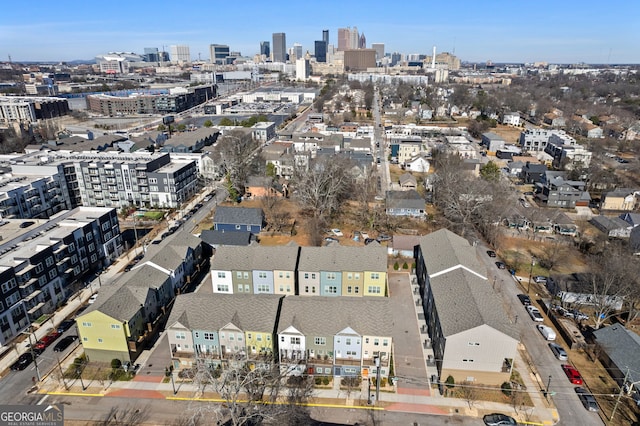 birds eye view of property featuring a view of city