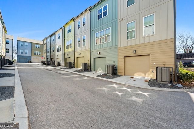 view of road with sidewalks and a residential view