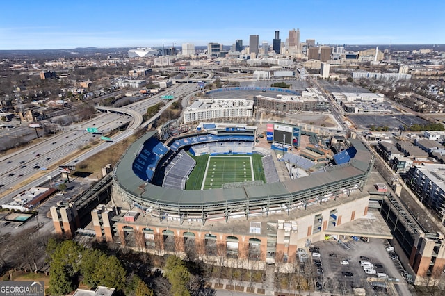 birds eye view of property with a view of city