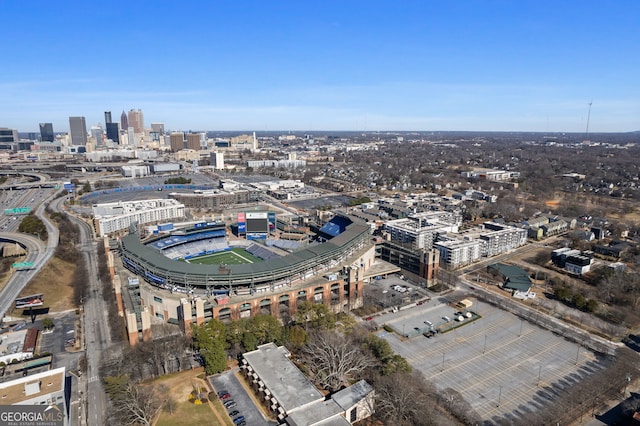 birds eye view of property with a view of city