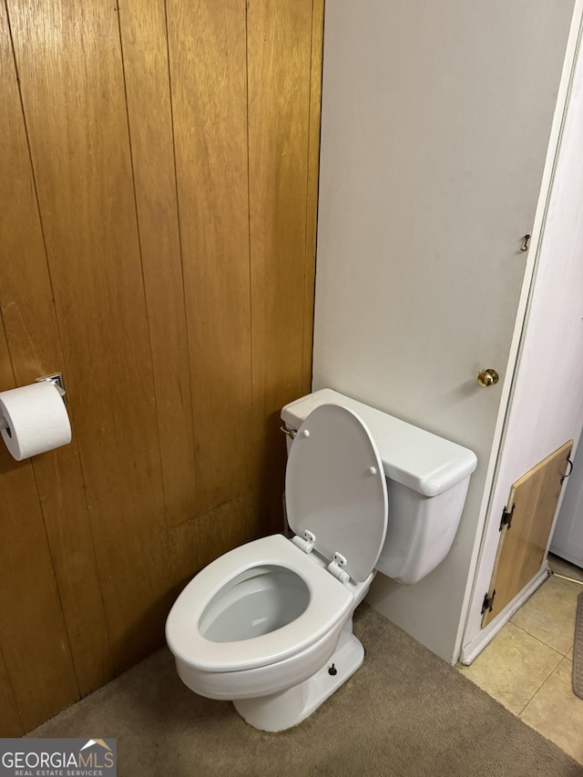 bathroom featuring tile patterned floors and toilet