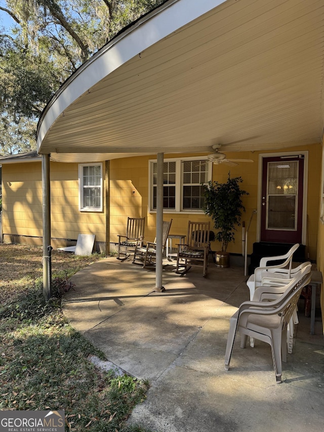 view of patio with ceiling fan