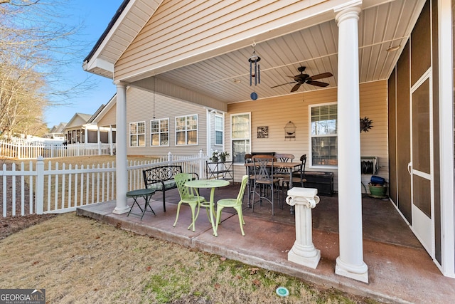 view of patio featuring ceiling fan