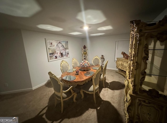 dining area featuring carpet floors