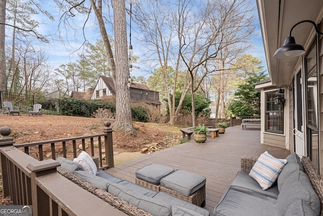 view of patio featuring outdoor lounge area and a deck