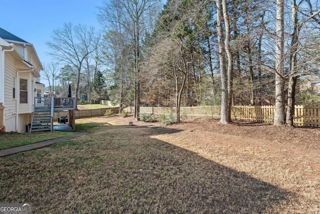 view of yard with a deck