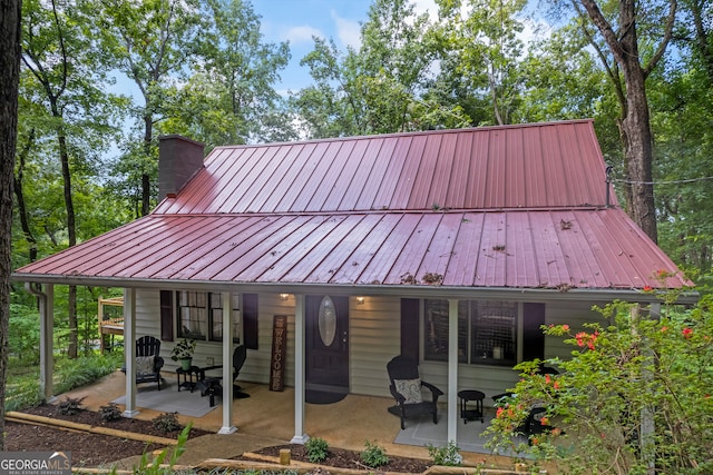 view of front of house with a patio area