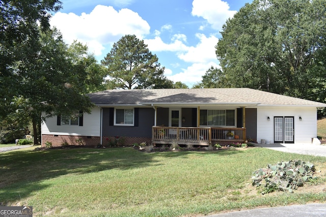 single story home with a porch and a front yard