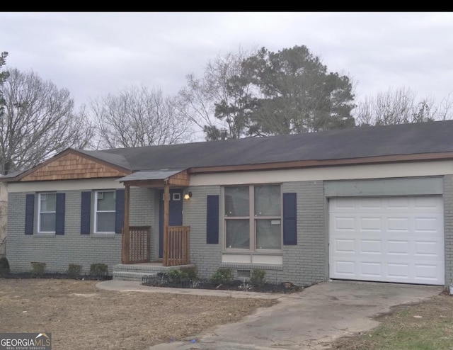 ranch-style home with a garage