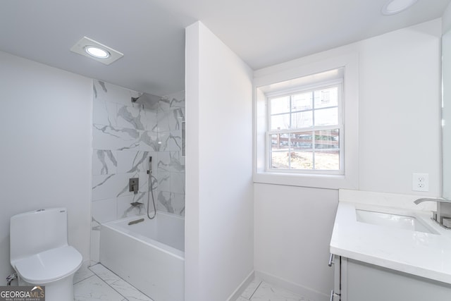 full bathroom featuring vanity, toilet, and tiled shower / bath combo