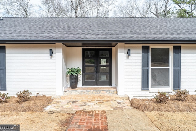 doorway to property featuring french doors