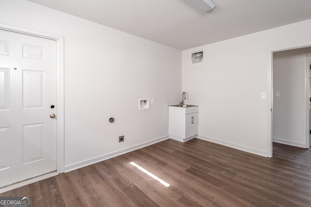 clothes washing area featuring sink, cabinets, washer hookup, dark wood-type flooring, and hookup for an electric dryer