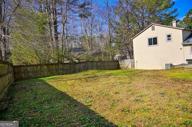 view of yard featuring central AC