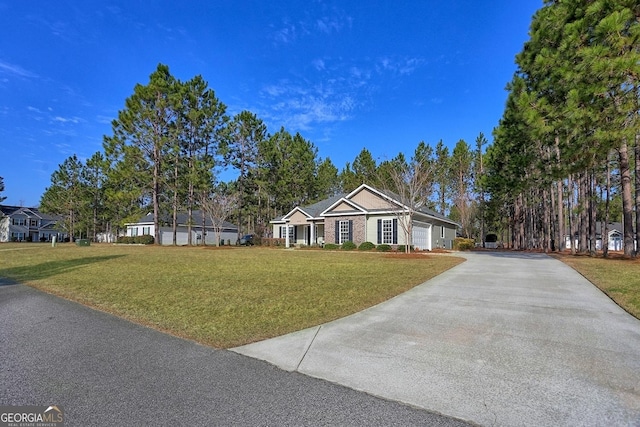 ranch-style house with a garage and a front lawn